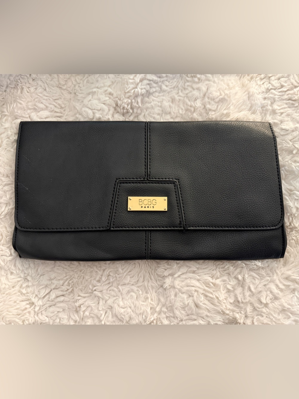 BCBG Black Fold-Over Clutch with Gold Logo Plaque